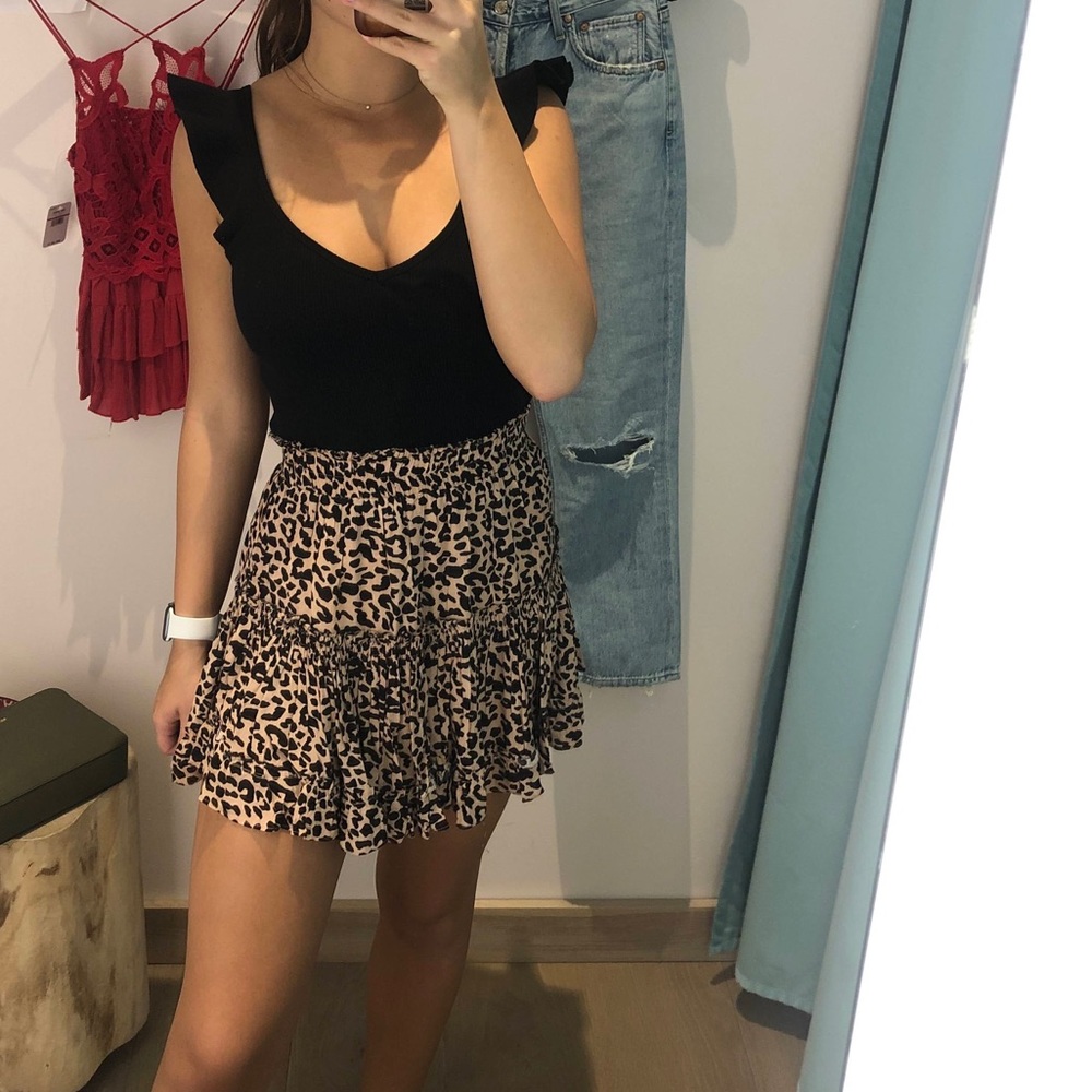South moon under cheetah skirt